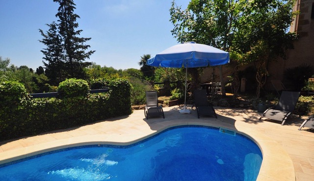 The Old Post Office, nestled in the hills with a private pool.