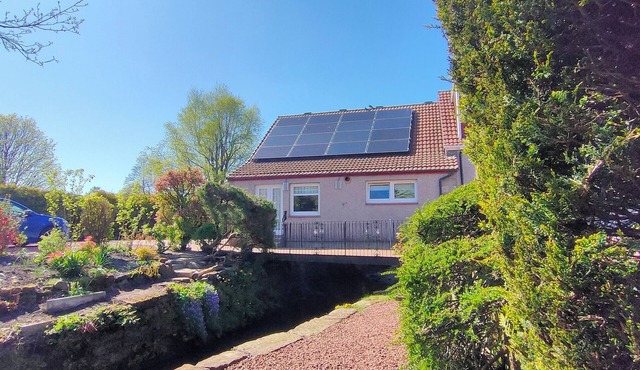 THE OLD SMIDDY COTTAGE, BALLOCH, LOCH LOMOND BUILT OVER A SCOTTISH BURN - stream