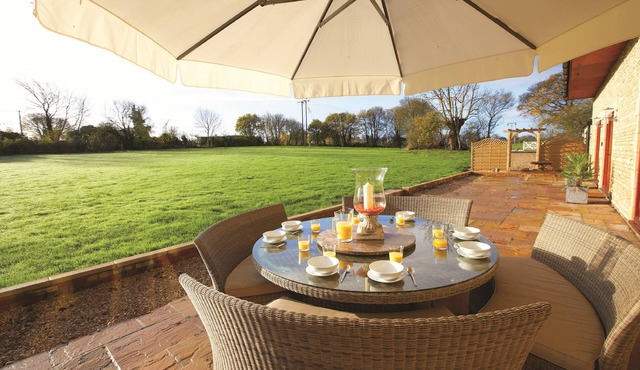 The Old Stables is a pretty farm cottage in Wiltshire, sleeps eight people, child friendly.