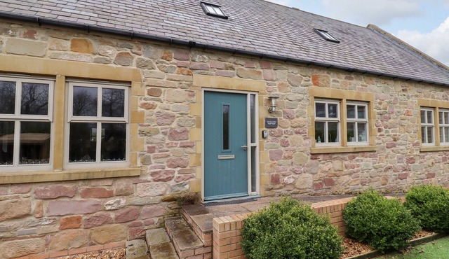THE OLD STABLES, pet friendly, with open fire in Bamburgh