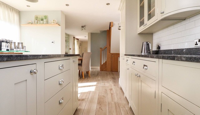 THE OLD STABLES, with a garden in Mere Brow