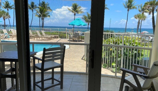 THE ONE! NEWLY RENOVATED GROUNDFLOOR BEACH/OCEAN FRONT CONDO with private deck!