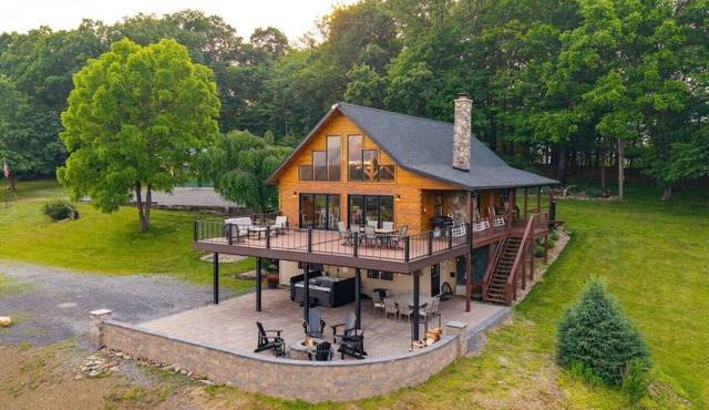 The perfect family retreat, hot tub, fire pit, playhouse for the kids with a zip line! Plenty of fun for the young and old alike! All while enjoying the majestic views of Juniata County.