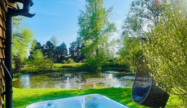 The perfect getaway. Set in stunning gardens overlooking a beautiful lake