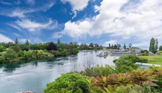 The Pier Taupo - right on the river - private pier & mooring!