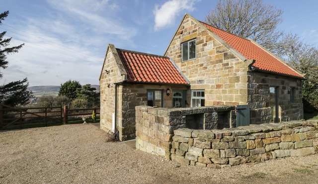 THE PIGGERY, character holiday cottage, with a garden in Sleights