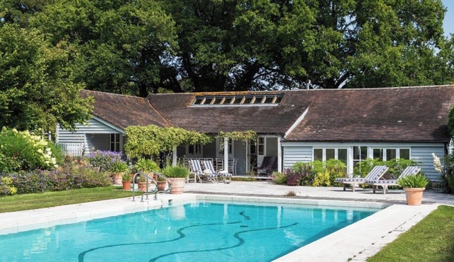 The Pool House - a delightful cabin with private pool bordering the South Downs.