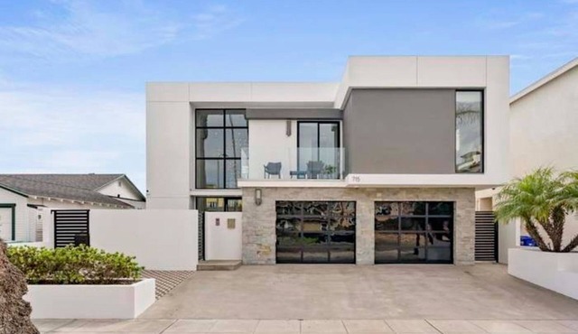 The premier Spacious 5-bedroom beach house in Oceanside over looking the beach.