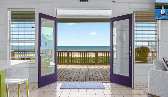 The Purple Pelican | Coastal Charm & Comfort