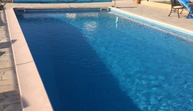 THE QUIET HOUSE BETWEEN SEA AND MOUNTAIN