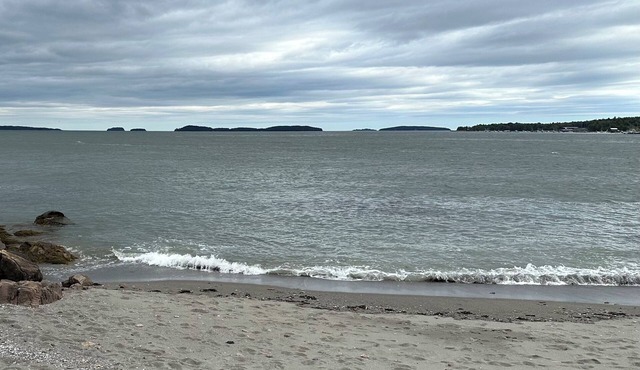 The real deal! Oceanfront home with private beach and expansive island view.