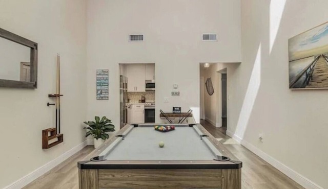 The Rockledge Billiard House- Beautiful renovated condo with pool table.