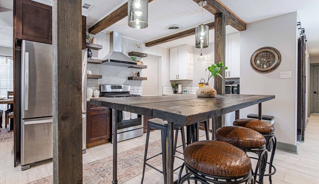 The Rustic Retreat! With a game room & a great outdoor vibe!