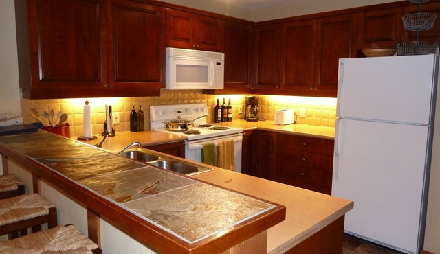 The snow is flying! Powderhorn 215 is a larger 1 BR/den w/slope views