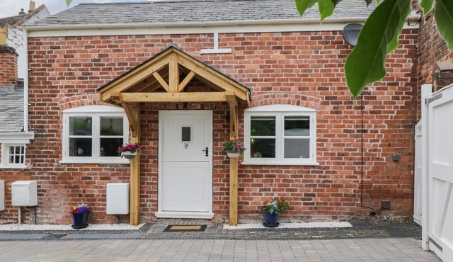 THE STABLES, with a garden in Worcester