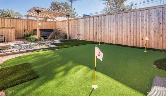 The SuiteSpot Hot Tub EV Charger Mini-Golf Private Yard, Sleeps 6