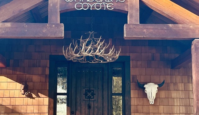 The "Wandering Coyote" riverfront home located on the Swan River in Bigfork, MT.
