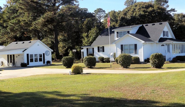 The Waterfield Place is a lovely 8 person home on 5 acres near the Outer Banks.