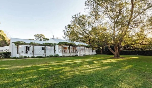 The White House | Bold Berry Farmhouse with Pool