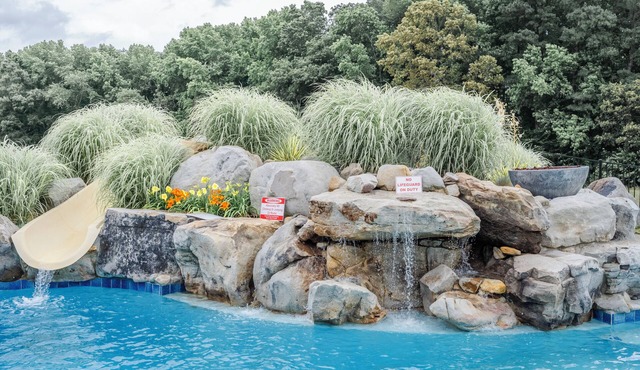 The Wilder Way with a beautiful pool, hot tub, and a pickleball court!