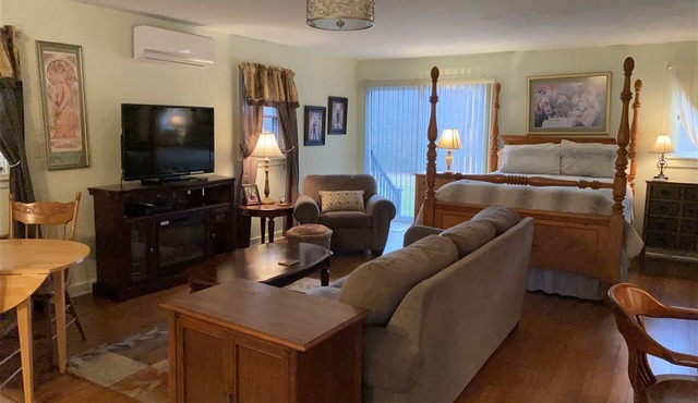The Willow House Cottage is surrounded by gardens on two private acres.