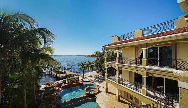 The Winslet Estate - Luxury riverfront 3-story home w/bar, gym, and heated pool - SWFL Rentals