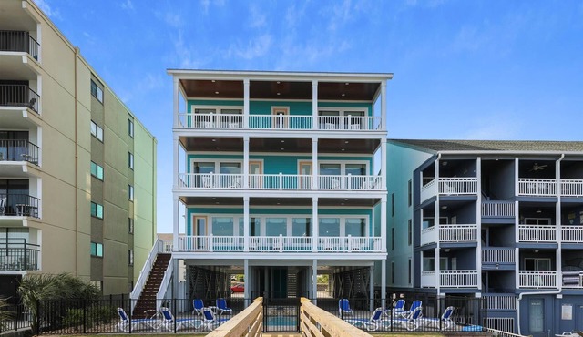 Thee Sun, Moon, & Stars will be yours in this Luxury Oceanfront, 9 Bedroom Home