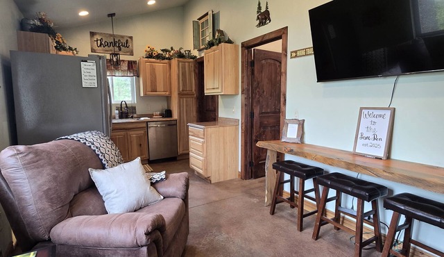 Themed Bear's Den Cabin nnestled in the pines minutes outside of Glacier Park.
