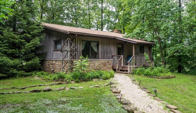 Thirty wooded acres, secluded, private five-acre lake, hot tub.