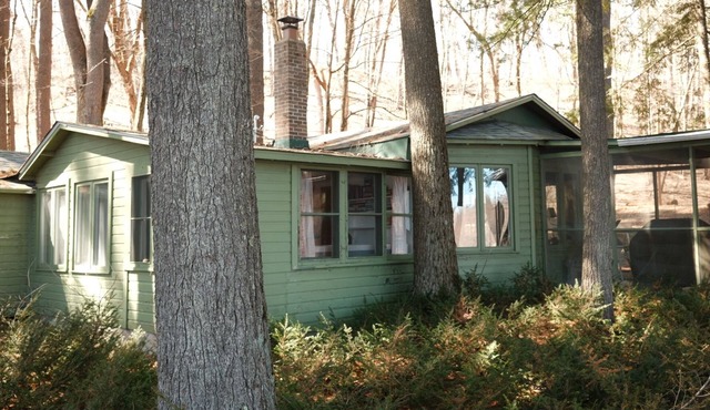 This 1920's river cabin is full of vintage charm. Nestled in a grove of white pines on the banks of the scenic saint croix river, this three bedroom, one bath cabin offers a space designed for rest and simplicity.