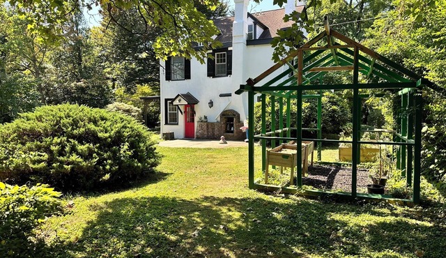 This 4 BR 4 BA sizable home with large outdoor porch & yard is ideal for a family visiting the area.