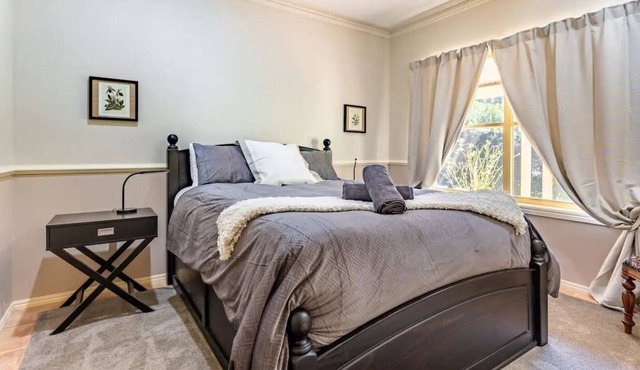 This 4BR French, country-style homestead offers the rural getaway !