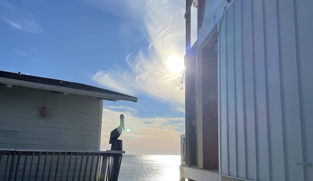 This adorable cottage is DIRECTLY ON THE BEACH-RARE FIND!