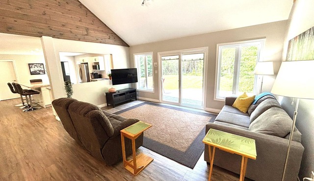 This bright and spacious retreat blends modern comfort with cozy cottage charm. Featuring a fully equipped kitchen, multiple cozy bedrooms, stylish bathrooms, and inviting living spaces with a wood-burning fireplace.