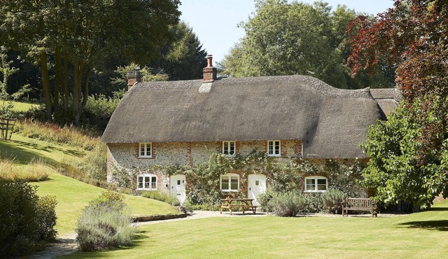 This beautiful 300-year-old detached thatched cottage nestled within the stunning Cranborne Chase.