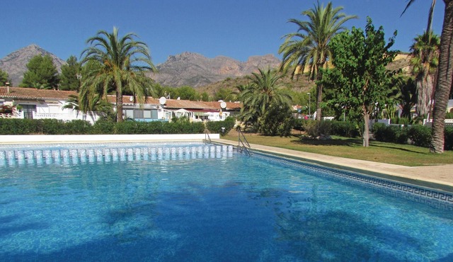 This beautiful vacation semi-detached house is located in a quiet settlement with pool, tennis court