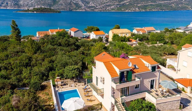 This beautiful vacation home with pool is located in a quiet location in the village of Kne.