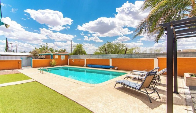 This centrally located 3 bedroom 2 bathroom features a full size pool and electric vehicle charging on site.