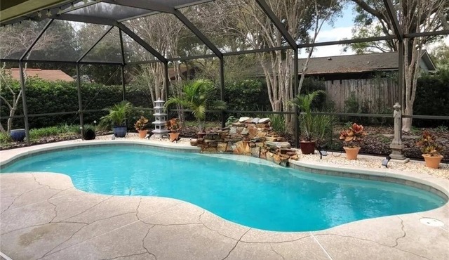 This Charming House with an outdoor pool, 3 bedrooms, 2 full baths.