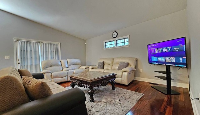 This charming two-level home offers the perfect mix of space and convenience