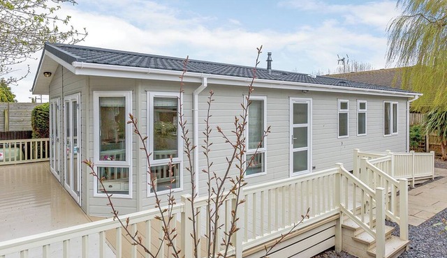This contemporary and spacious lodge is ideal for a family escape by the sea.