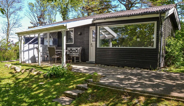 This cozy vacation accommodation is divided into two small houses, one with kitchen and one bedroom