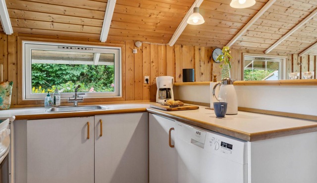 This cozy vacation home awaits you near the Roskilde fjord shore.