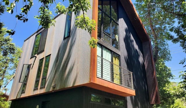 This deluxe modern new 3-story home with central AC offers the best of Bozeman!