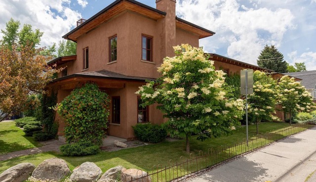 This deluxe Spanish-style 4-bedroom home offers the best of Bozeman!