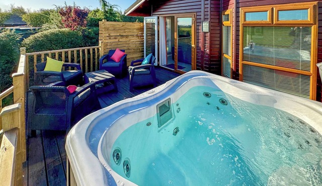 This deluxe two bedroom lodge even has its own games den.