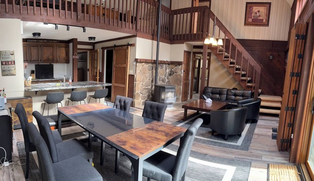 This dramatic home Located inside THE HIDEOUT offers a unique layout