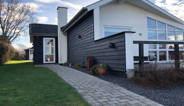 This family-friendly house on the Baltic Sea offers sea views and proximity to the beach