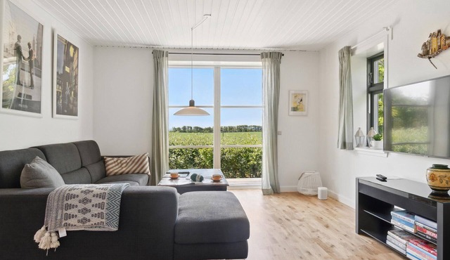 This former and beautiful homestead welcomes you with a view of the Limfjord in Ertebølle