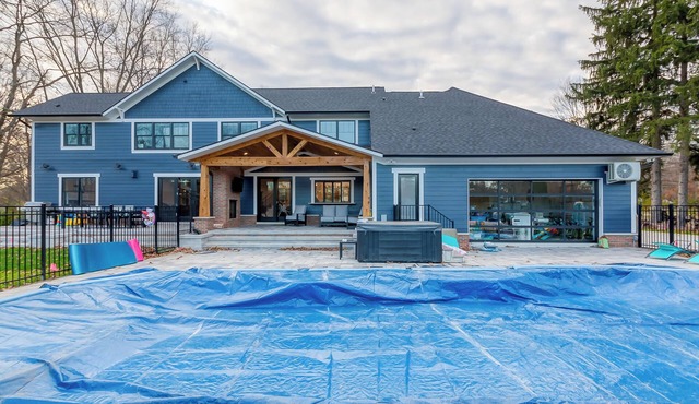 This house has it all! Swimming,, hot tub, sauna, basketball, and movie room!